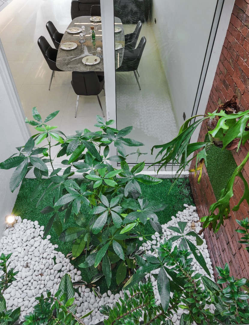 concrete house in lush environment